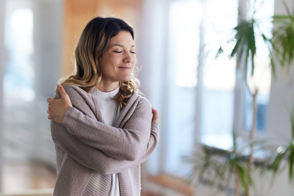 woman-embracing-herself